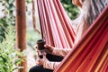 Natural drink tea with tasty flavour in a wooden glass vase - alternative diversity woman smile and enjoy the outdoor leisure