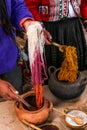 Natural dyeing of alpaca wool. Chinchero, Peru