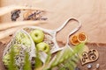 Natural, eco-friendly, zero waste background. Eco shopping bag with apples on crumpled paper among bark tree, pebbles