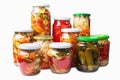 Natural eco vegetables in various combinations canned in glass jars Royalty Free Stock Photo