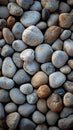 Natural elegance close up of rounded grey river rocks formation