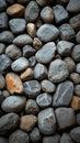 Natural elegance close up of rounded grey river rocks formation