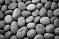 Natural elegance close up of rounded grey river rocks formation