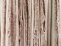 Natural fabric texture. Crumpled cloth textile background. Draped raw organic cloth grey tonos pattern