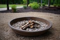 natural fire pit with unscattered ashes