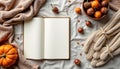 natural flat lay of a rustic journal, knit gloves, acorns Royalty Free Stock Photo