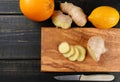 Natural flu and cold remedy - orange and lemon fruit, fresh ginger Royalty Free Stock Photo