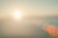 Natural fog and mountains sunlight background blurring, misty waves warm colors and bright sun light. Christmas background sky Royalty Free Stock Photo