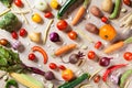 Natural food on kitchen table. Autumn vegetables and crop top view.