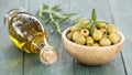 Natural food and medicine, new year resolutions, healthy lifestyle concept, green olives and oil