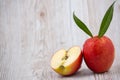 Natural fresh fruit apple in the background, cut in half oranges, vitamin C, for good health everyday Royalty Free Stock Photo