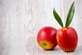 Natural fresh fruit apple in the background, cut in half oranges, vitamin C, for good health everyday Royalty Free Stock Photo