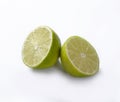 Natural fresh lime with slice of green lime citrus fruit stand isolated on white background. Royalty Free Stock Photo