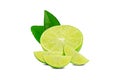 Natural fresh lime with water drops and slice of green lime citrus fruit stand isolated Royalty Free Stock Photo