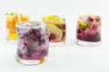 Natural fruit iced-T juice with ice, lemon and sliced fruits in