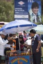 Natural fruit juices vendor in action, Tupiza Market. Bolivia Royalty Free Stock Photo