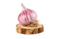 Natural garlic on a wooden stand.
