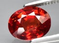 natural garnet spessartite gem on the background Royalty Free Stock Photo