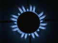 Natural gas burning a blue flames on black background Royalty Free Stock Photo