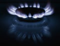 Natural gas burning a blue flames on black background Royalty Free Stock Photo