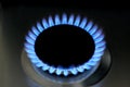 Natural gas burning on kitchen gas stove on black Royalty Free Stock Photo