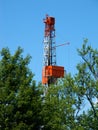 Natural Gas Drill Peaking Above Trees Royalty Free Stock Photo