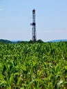 Natural Gas Drill Rising Out of Cornfield