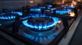 Natural gas flame. Gas flame on dark background. Blue flames from gas stove Royalty Free Stock Photo