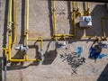 Natural gas meters and pipes on old dirty wall.