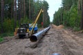 Natural gas pipeline construction work. A dug trench in the ground for the installation and installation of industrial gas and oil Royalty Free Stock Photo