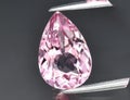 Natural gem pink tourmaline on gray background Royalty Free Stock Photo