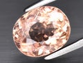 Natural gem pink tourmaline on gray background Royalty Free Stock Photo