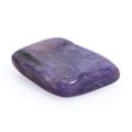Natural gemstone purple charoite isolated on white background Royalty Free Stock Photo
