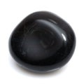 Natural gemstone black onyx isolated on white background