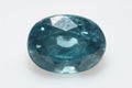 Natural gemstone blue zircon on background Royalty Free Stock Photo