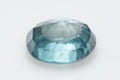 Natural gemstone blue zircon on background Royalty Free Stock Photo