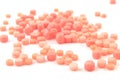 Natural gemstone pink coral beads on a white background Royalty Free Stock Photo