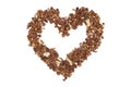 Natural granola heart with oatmeal, nuts, fruits and chocolate. The concept of healthy food, diet, weight loss