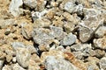 Natural gray gypsum stone. Close up image of stones with black and white. Industrial mining area. Limestone mining, quarry