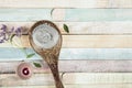 Natural gray mud mask cream on wooden spoon. Royalty Free Stock Photo