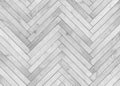 Natural gray wooden parquet herringbone. Wood texture.