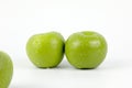 Natural Green Apple Isolated on White Background, with water drops on the peels Royalty Free Stock Photo