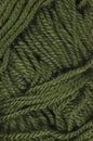 Natural green fine wool threads texture, vertical textured yarn clew macro closeup background pattern Royalty Free Stock Photo