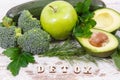 Natural green fruit and vegetables as source vitamins and minerals, healthy nutrition and detoxification concept