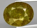 natural green yellow grossular garnet gemstone on the background Royalty Free Stock Photo