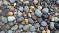 Natural Ground Texture: Assortment of River Rocks and Gravel Background Royalty Free Stock Photo