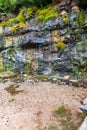 Natural ground water weeping through a sandstone wall Royalty Free Stock Photo