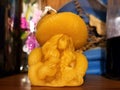Natural handcrafted beeswax candle. Beewax candle mariachi woman with sombrero.