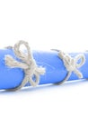 Natural handmade rope bows tied on blue message scroll isolated Royalty Free Stock Photo