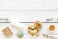 Natural herbal cosmetics with ginger on white wooden background top view space for text Royalty Free Stock Photo